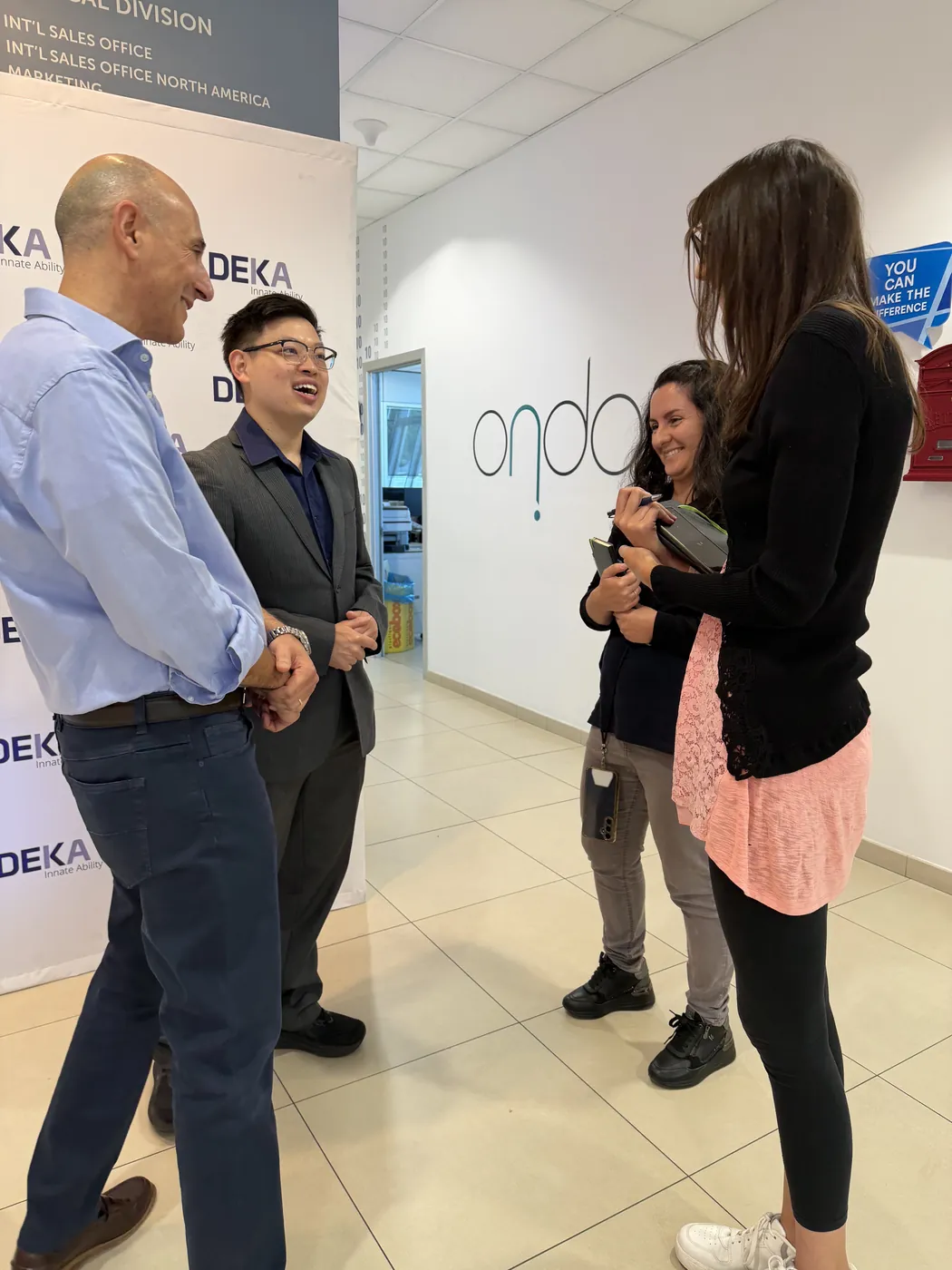 Dr Sin Yong in conversation with Tiziano Zingoni and the DEKA clinical research team