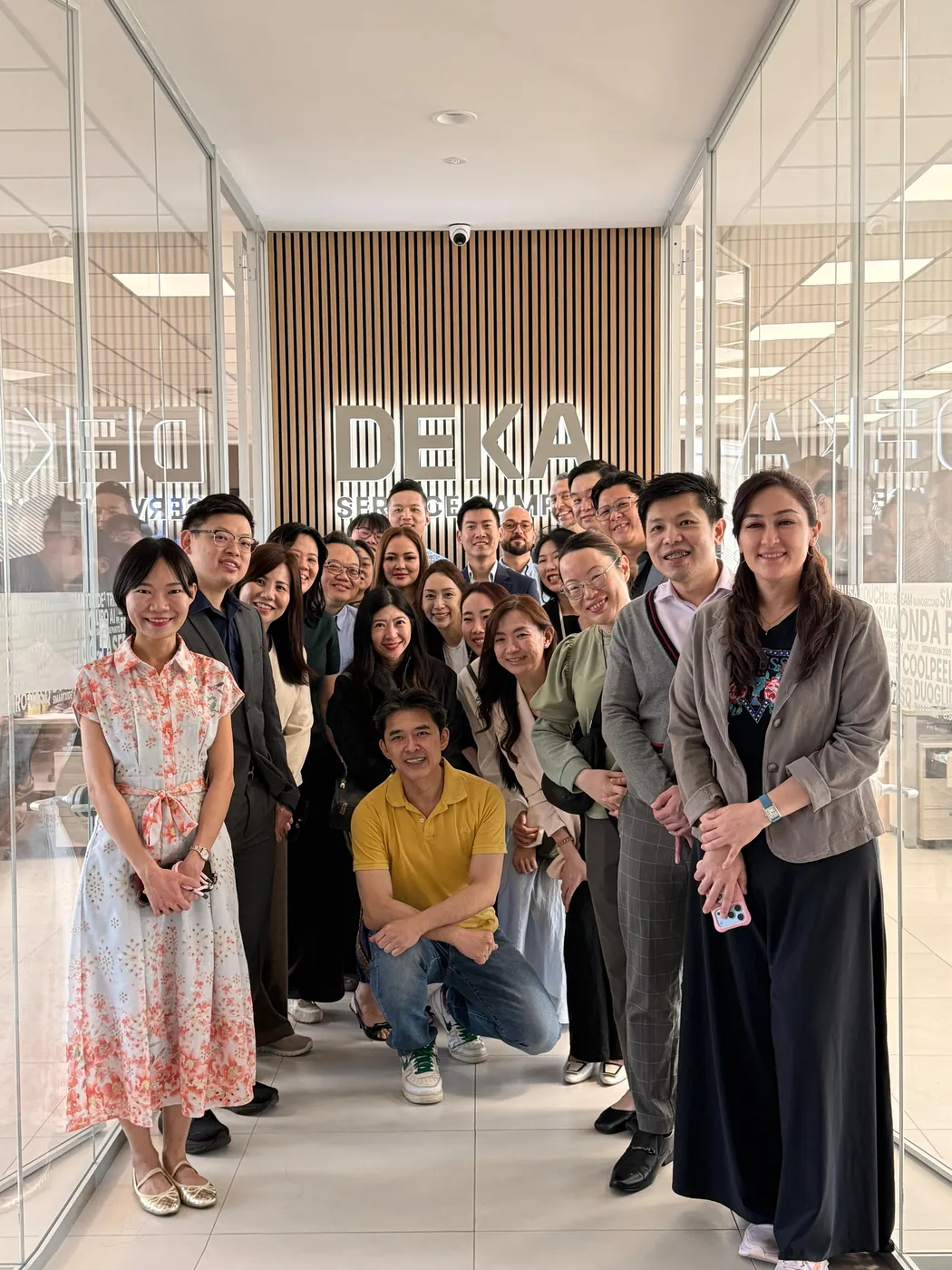 The DEKA Academy group at the DEKA office entrance in Calenzano