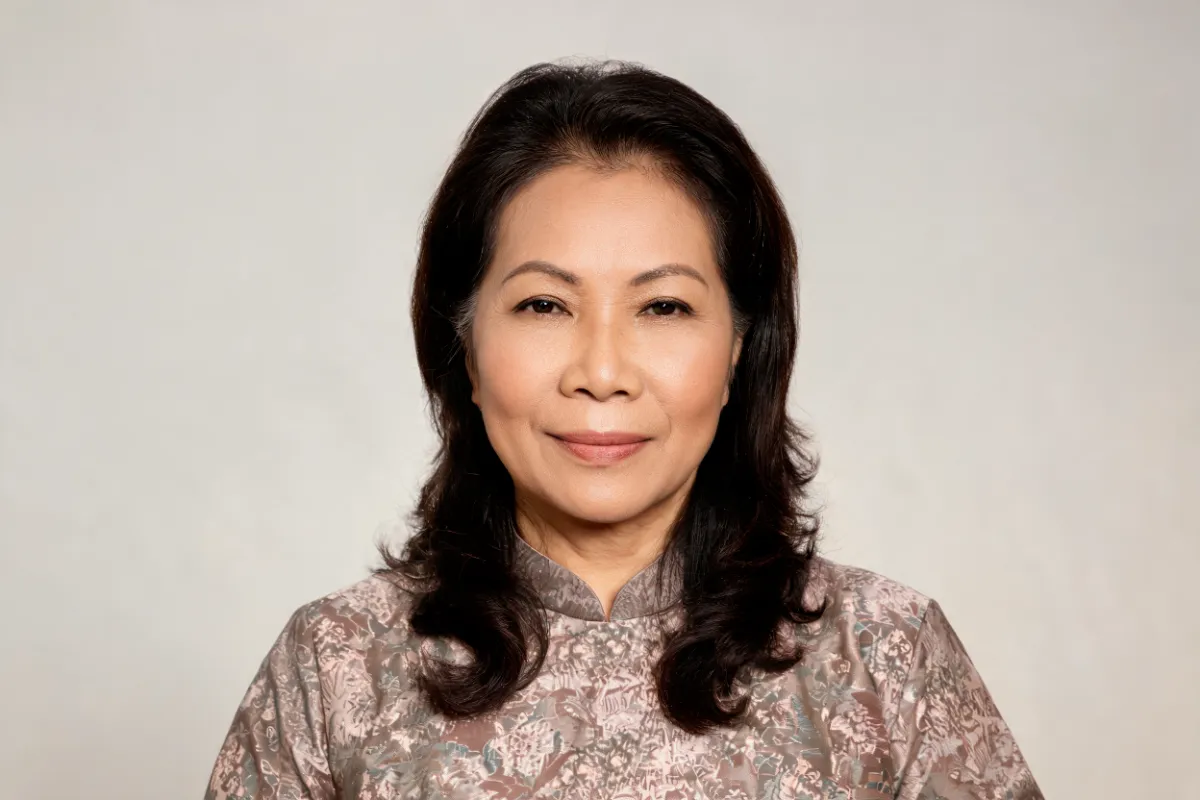 A woman in her fifties looking at the camera with a relaxed brow (illustrative image, not a patient)