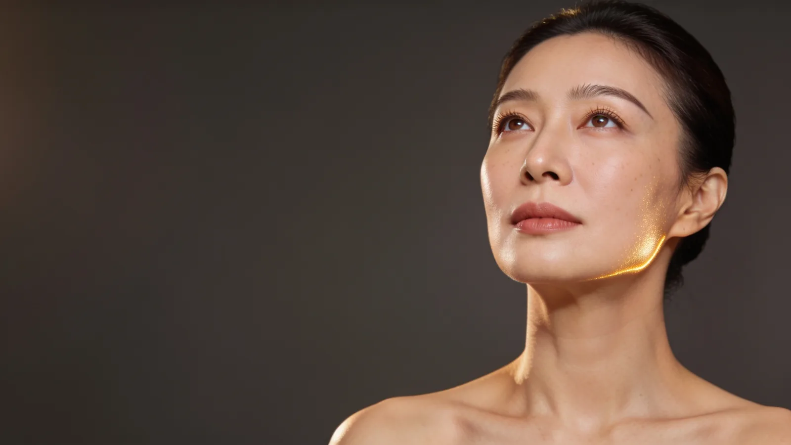 Illustrative model with open, relaxed upper eyelids — not a patient